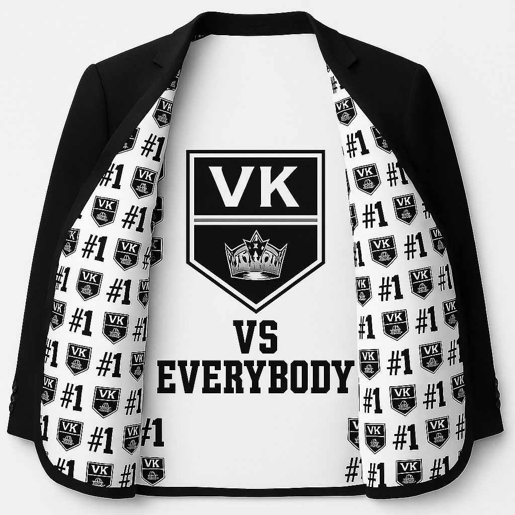 Black blazer with white shirt featuring VK logo and 'VS EVERYBODY' text on a white background